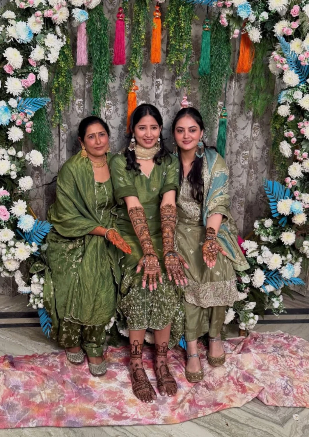 Group mehndi celebration with three guests