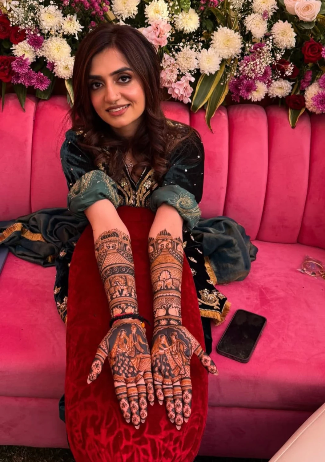 Detailed bridal mehndi displayed on both hands
